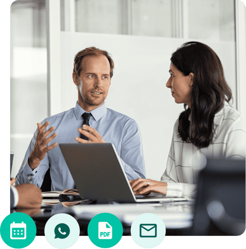man and woman talking in front of a laptop with tuotempo's icons